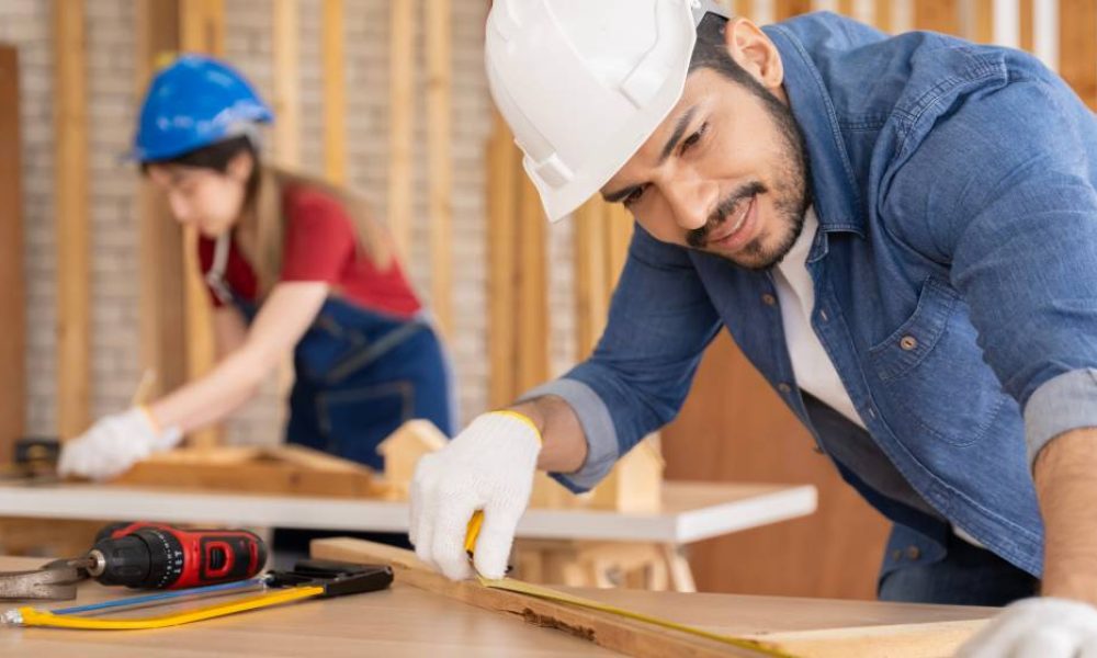 Smart and good looking Asian male carpenter. I am designing furniture to decorate my house. professionally